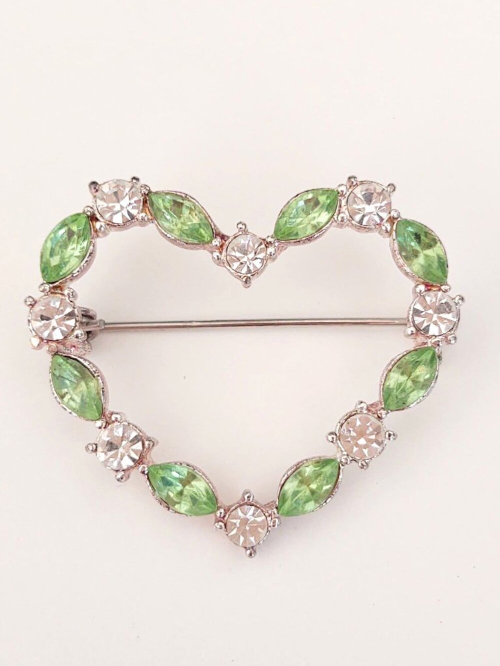 Green and clear glass heart brooch